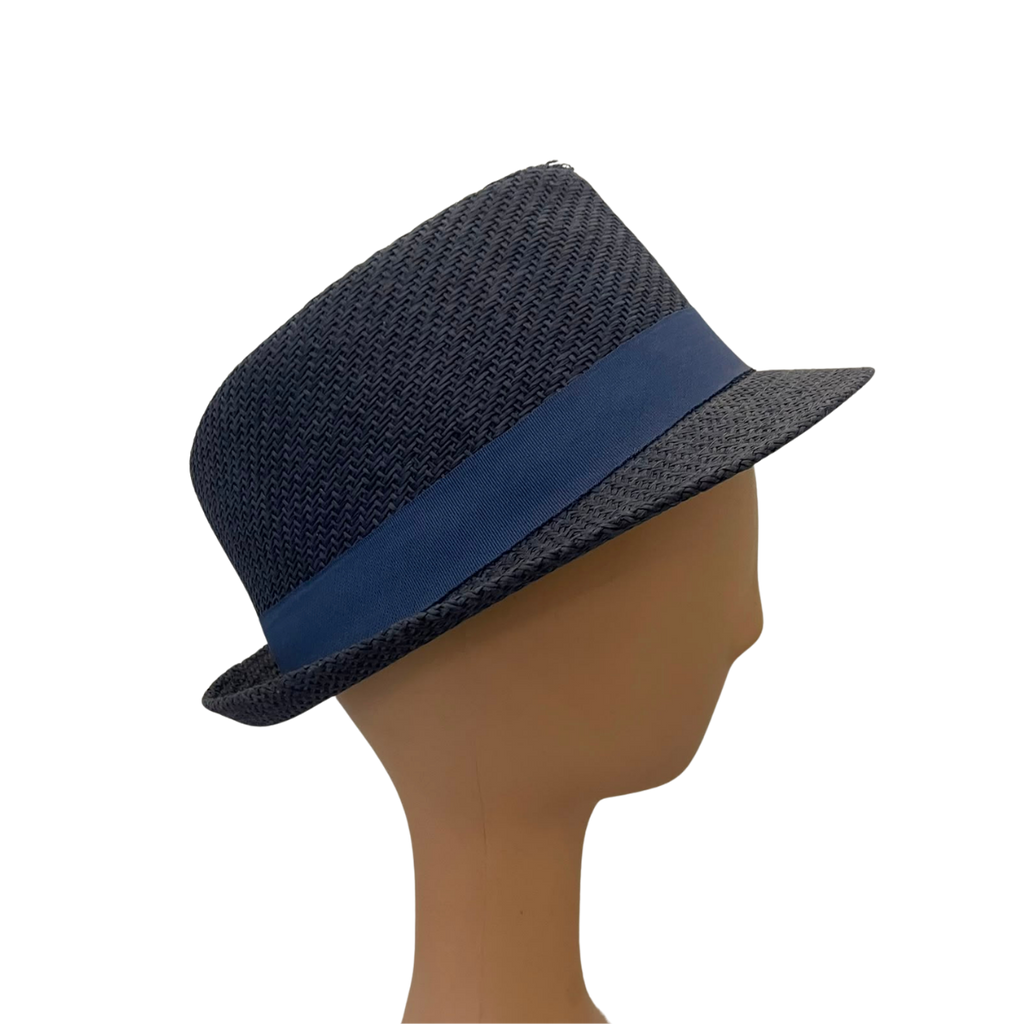 A dark navy blue woven fedora hat with a solid navy blue band, displayed on a tan mannequin head against a plain white background.
