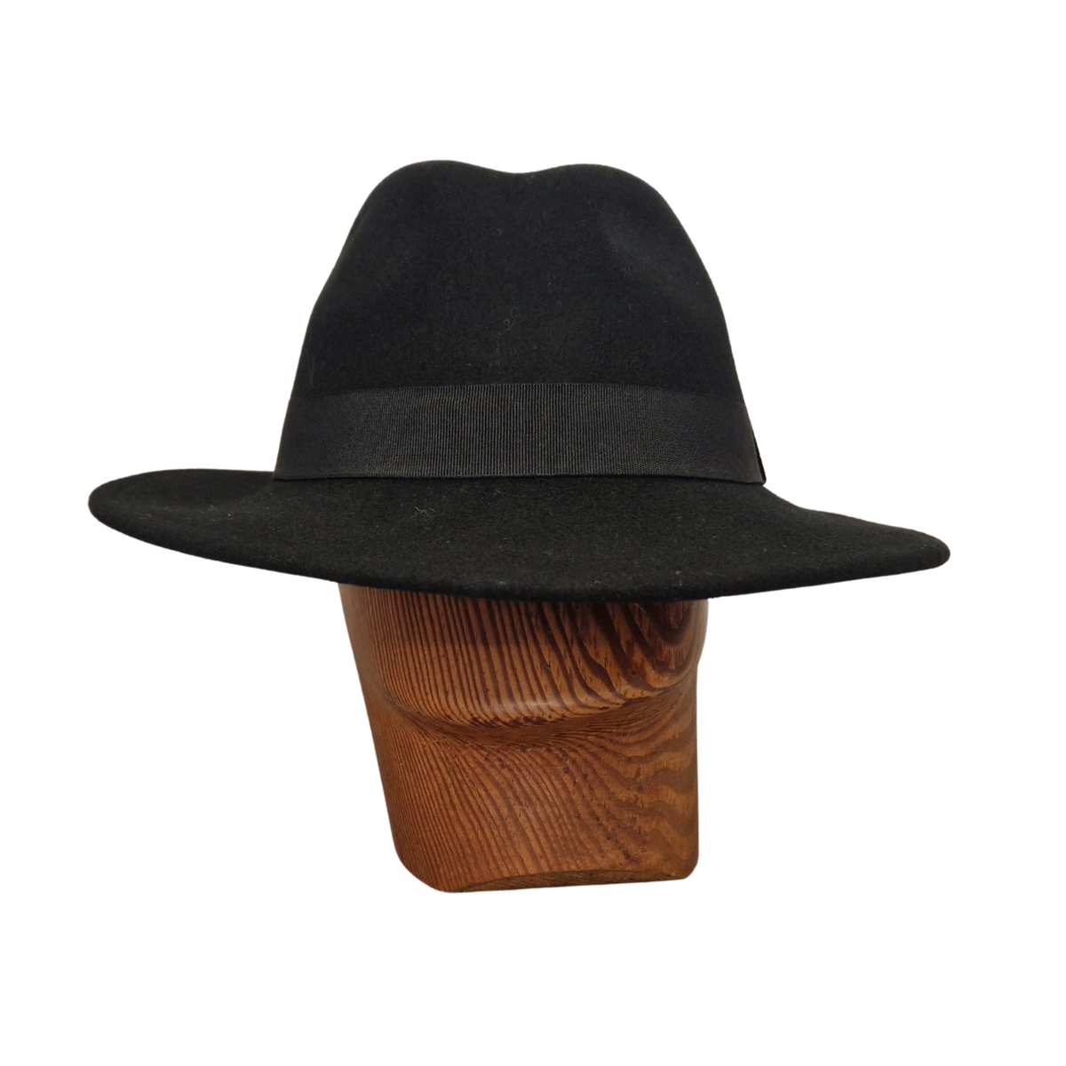 A black felt fedora hat with black ribbon band displayed on a wooden mannequin head against a plain white background. Front