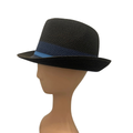 A black woven fedora hat with a blue band, displayed on a beige mannequin head against a white background.