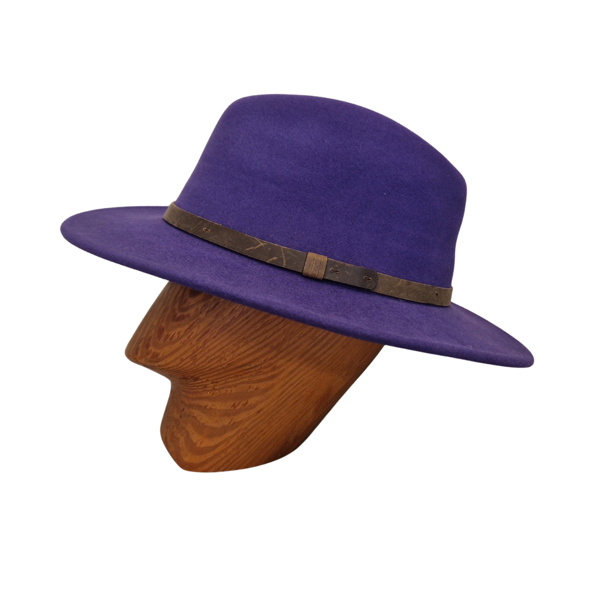 A purple felt fedora hat with a brown leather band, displayed on a wooden mannequin head against a plain white background. Side