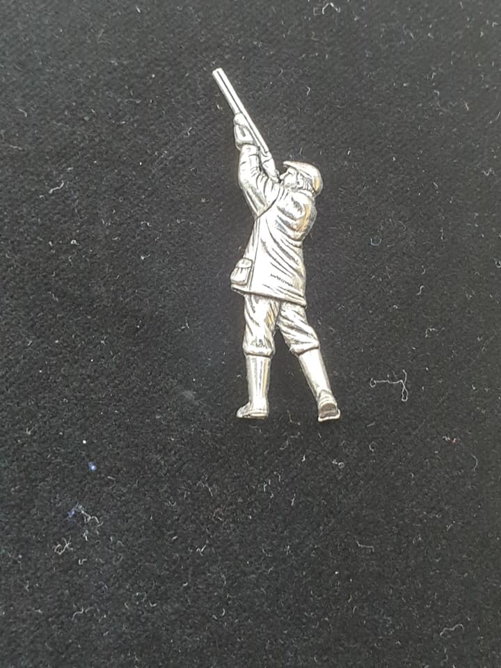 Tie Pin / Pin Badge Shooting Man Design.